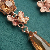 Gold Metal Tassel Earrings with Grey Stone | Long Party Wear Earrings for Women & Girls