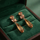 Gold Metal Tassel Earrings with Grey Stone | Long Party Wear Earrings for Women & Girls